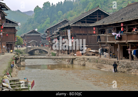 Typical wooden buildings characterize a Dong Village Zhaoxing Guizhou Province China Stock Photo