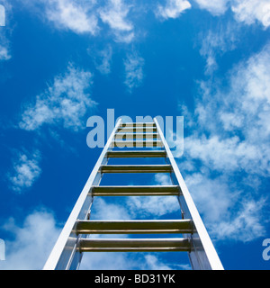 Ladder against blue sky. Stock Photo