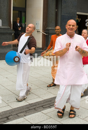 Hare Krishna followers singing Stock Photo