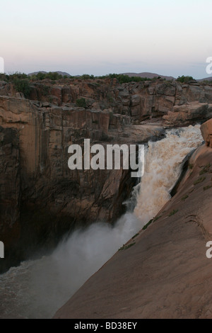 The Orange River plunges down the Augrabies waterfall in South Africa's Northern Cape Stock Photo