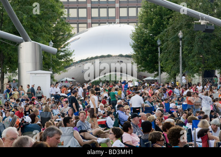 Crowds at a free concert performance in Jay Pritzker Pavilion in Millenium Park Chicago Illinois Stock Photo