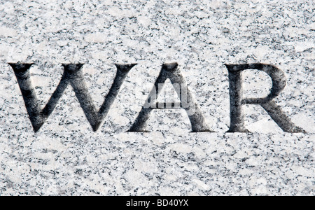 The word war carved in stone Stock Photo