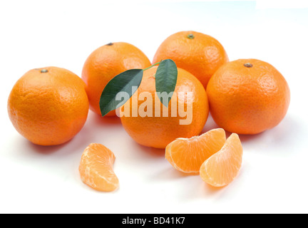 clementines with segments on a white background Stock Photo