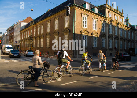 Cyclists waiting for green light in central Copenhagen Denmark Europe Stock Photo