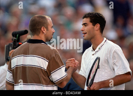 Pete Sampras USA congratulated by Andre Agassi USA on his victory at the 1995 US Open Tennis Championships Stock Photo