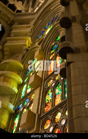 details and colorful cast from stained glass windows at La Sagrada Familia church in Barcelona, Spain. Stock Photo