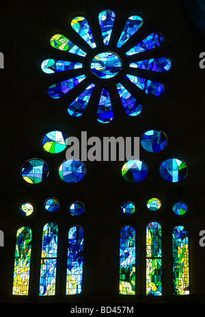 details and colorful cast from stained glass windows at La Sagrada Familia church in Barcelona, Spain. Stock Photo