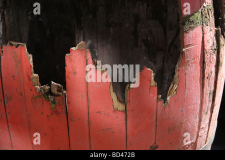 detail from a softly sunlit old red barrel Stock Photo