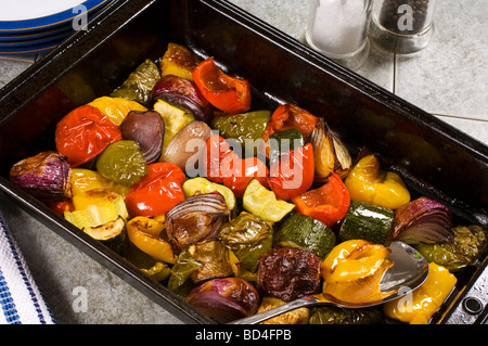 Roasted vegetables in the oven pan Stock Photo