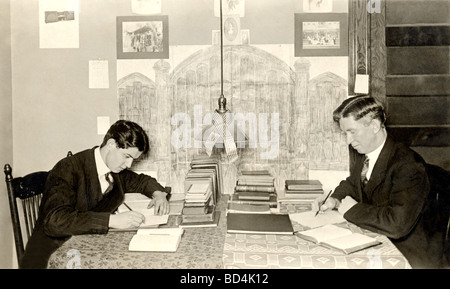 Two College Students Studying in Dorm Room Stock Photo