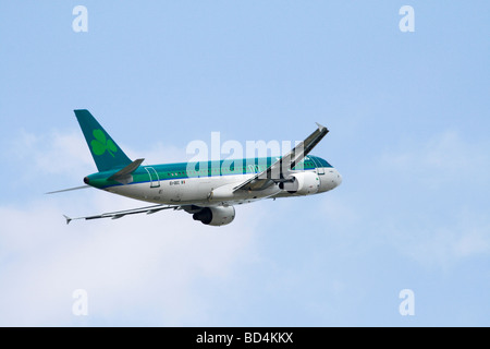 Passenger plane, Airbus A 320, Aer Lingus Airline, in climb flight Stock Photo