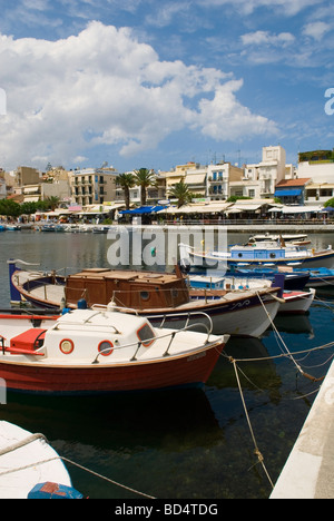 Boats on Lake Voulismeni Agios Nikolaos Crete Stock Photo