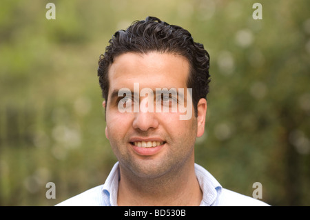 Handsome ethnic man smiling outdoors Lebanon Middle East Stock Photo