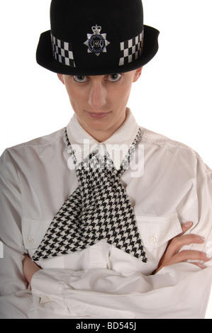 Woman Police officer with stern look showing handcuffs about to arrest ...