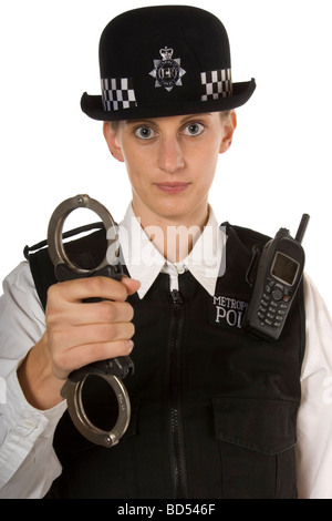 Police officer holding handcuffs Stock Photo - Alamy