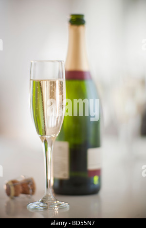 Champagne flute and bottle Stock Photo