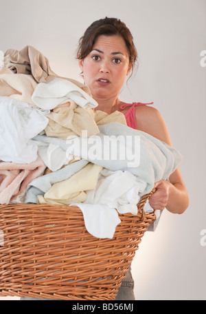 Woman doing laundry Stock Photo