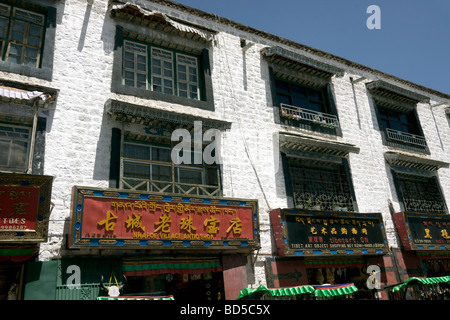 old traditional tibetan houses used as shops on the barkhor circuir in lhasa Stock Photo