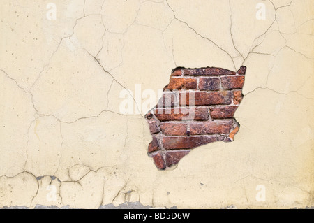 Plaster background with brick wall Stock Photo