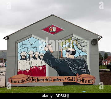 A mural depicting the Protestant Reformer Martin Luther on a house end in Shankill Parade as part of  'Re-imaging Communites'. Stock Photo
