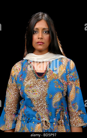 Indian Businesswoman in ethic attire isolated over a black background Stock Photo