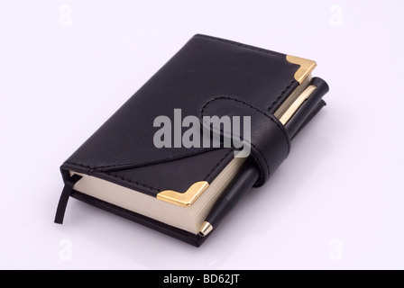 Black leather diary on a white background Stock Photo