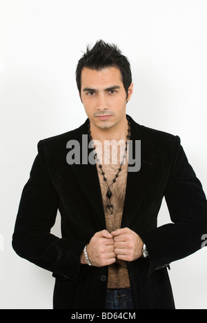 Handsome young man wearing a black blazer jacket Stock Photo