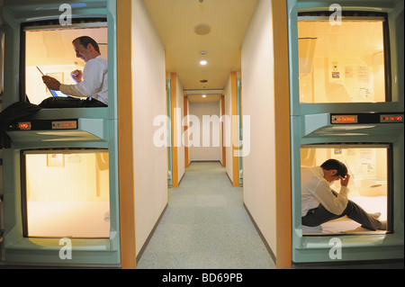 Businessmen sitting in hotel Stock Photo