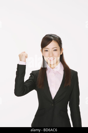 Businesswoman celebrating victory Stock Photo