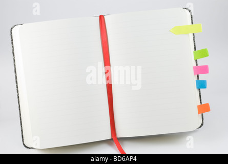 Lined shorthand open notepad on white background Stock Photo