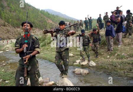 RUKUM DISTRICT NEPAL APRIL 22 2004 Maoist insurgents celebrate in Rukum district April 22 2004 weeks after their attack on Stock Photo