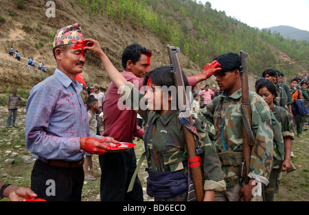 RUKUM DISTRICT NEPAL APRIL 22 2004 Maoist insurgents celebrate in Rukum district April 22 2004 weeks after their attack on Stock Photo