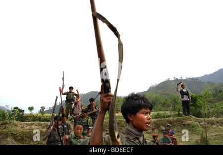 RUKUM DISTRICT NEPAL APRIL 22 2004 Maoist insurgents celebrate in Rukum district April 22 2004 weeks after their attack on Stock Photo