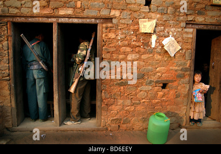 RUKUM DISTRICT NEPAL APRIL 21 2004 Maoist insurgents visit a local shop in Rukum district April 21 2004 weeks after their Stock Photo