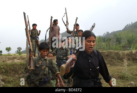 RUKUM DISTRICT NEPAL APRIL 22 2004 Maoist insurgents celebrate in Rukum district April 22 2004 weeks after their attack on Stock Photo