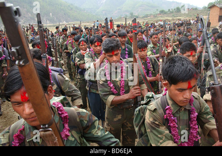 RUKUM DISTRICT NEPAL APRIL 22 2004 Maoist insurgents celebrate in Rukum district April 22 2004 weeks after their attack on Stock Photo