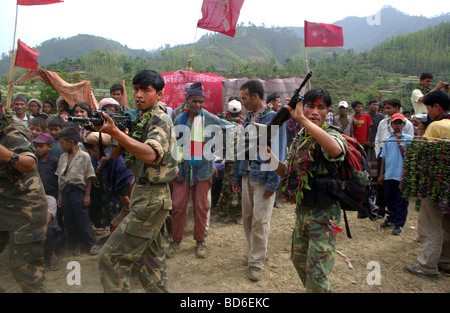 RUKUM DISTRICT NEPAL APRIL 22 2004 Maoist insurgents celebrate in Rukum district April 22 2004 weeks after their attack on Stock Photo