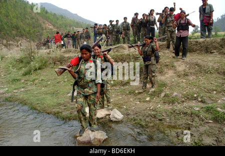 RUKUM DISTRICT NEPAL APRIL 22 2004 Maoist insurgents celebrate in Rukum district April 22 2004 weeks after their attack on Stock Photo