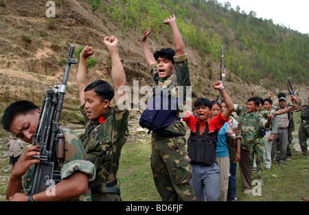 RUKUM DISTRICT NEPAL APRIL 22 2004 Maoist insurgents celebrate in Rukum district April 22 2004 weeks after their attack on Stock Photo