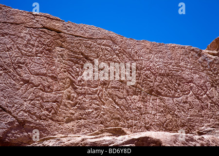 Ancient Petroglyphs on the rock walls at Yerbas Buenas, Atacama Desert, Chile Stock Photo