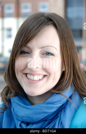 Natural looking young caucasian brunette with a beautiful smile Stock Photo