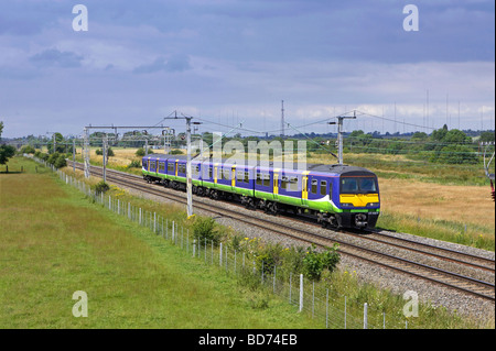 London Midland Class 321 no 321420 passes Barby Nortfoft with a WCML stopper to London on 09 07 09 Stock Photo