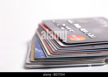 Stack of credit cards cutout against a white background Stock Photo