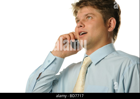 The businessman talking by a mobile phone Young the man of the European appearance Stock Photo