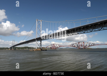 Forth Road Bridge and in the background the Forth Rail Bridge. Stock Photo