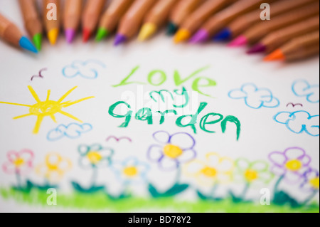 Love my garden, child's drawing and coloured pencils Stock Photo