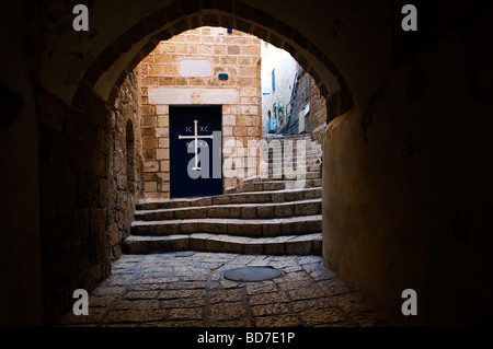 An arched alley leading to St. Michael's Greek Orthodox Church in the old city of Jaffa Israel Stock Photo
