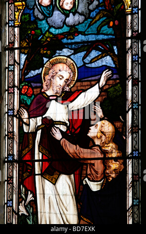 Stained Glass Window designed by Ward and Hughes depicting Jesus Christ appearing before Mary Magdalene on the First Easter Morning Stock Photo