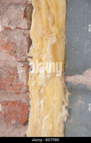 Fibreglass insulation in cavity wall Stock Photo