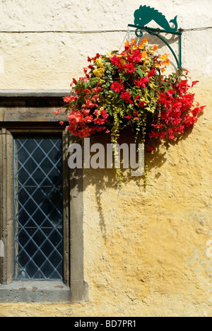 Tetbury Market Hall hanging flower basket Stock Photo